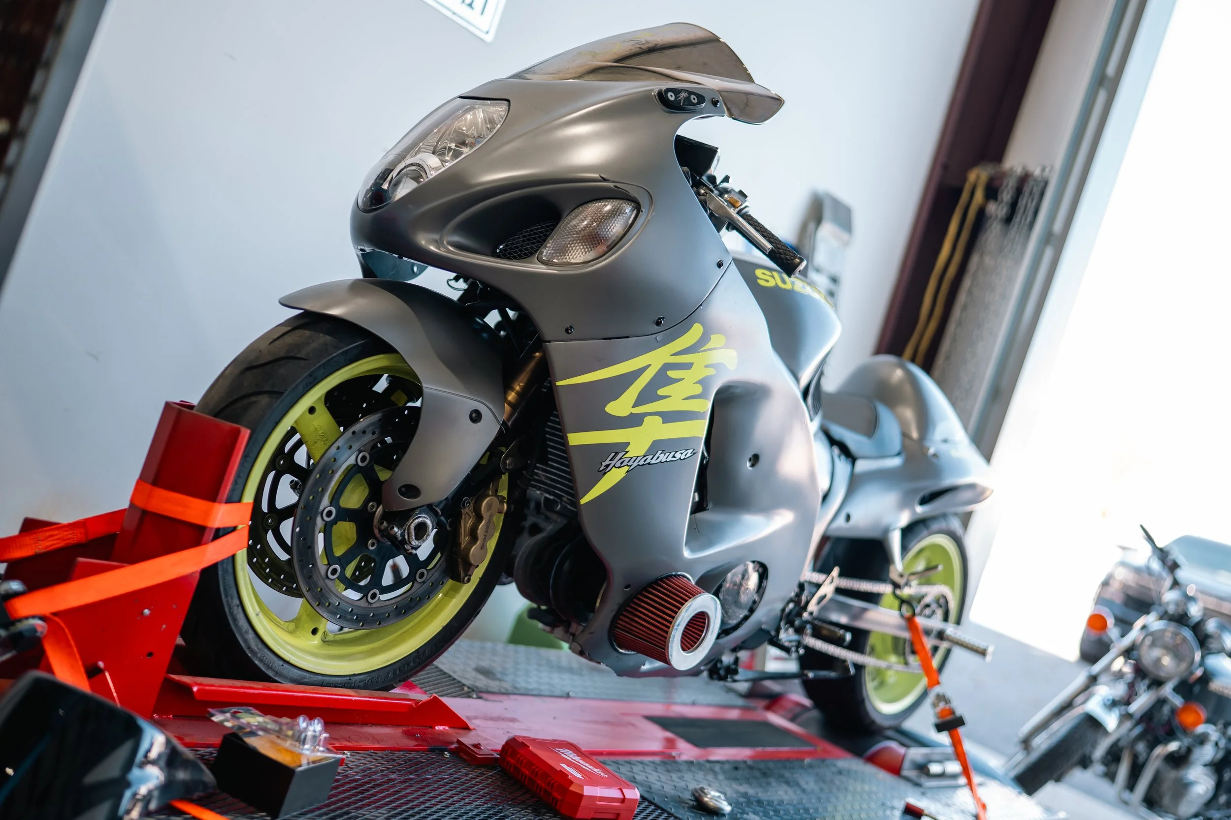 Suzuki on a workshop lift